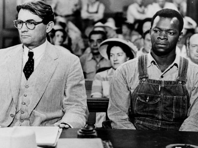 Atticus Finch (Gregory Peck) and Tom Robinson (Brock Peters) in a scene from 'To Kill a Mockingbird'