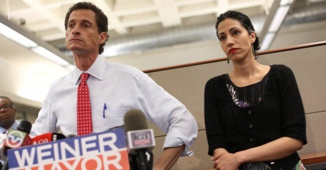 Disgraced politician Anthony Weiner and his wife, Huma Abedin, in a scene from the documentary 'Weiner'