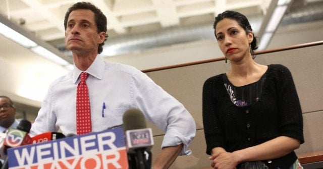 Anthony Weiner and his wife, Huma Abedin, during a press conference.