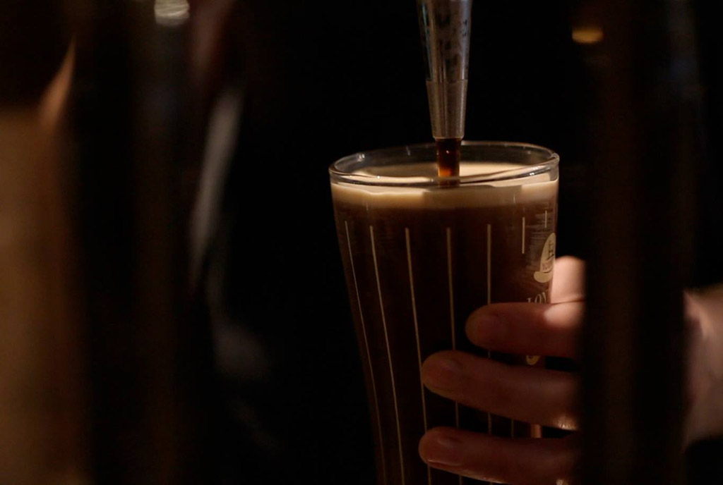 pint of Young's stout from a tap