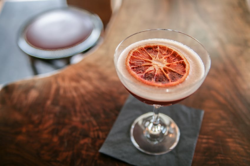 Blood orange cocktail with orange slice
