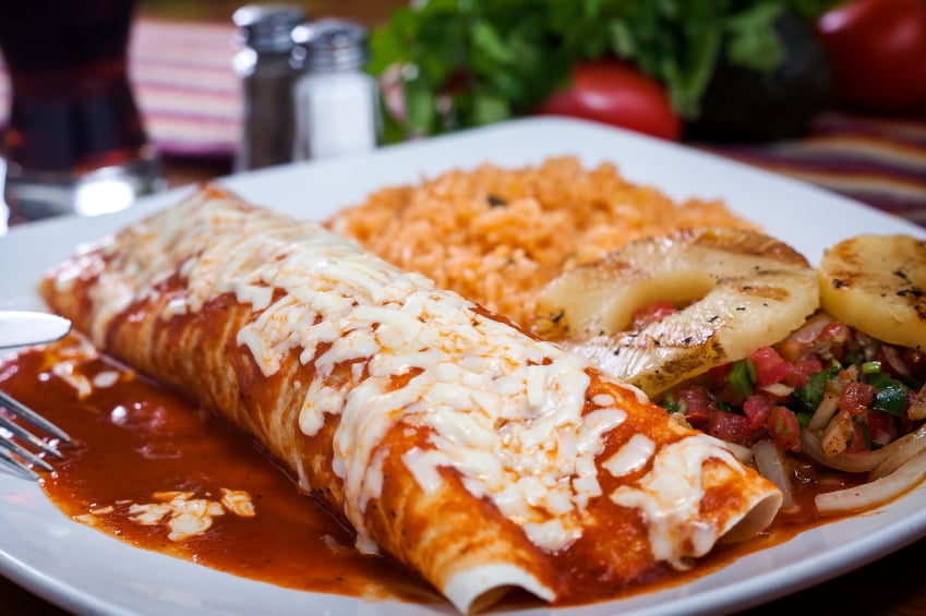 cheesy enchiladas with red enchilada sauce