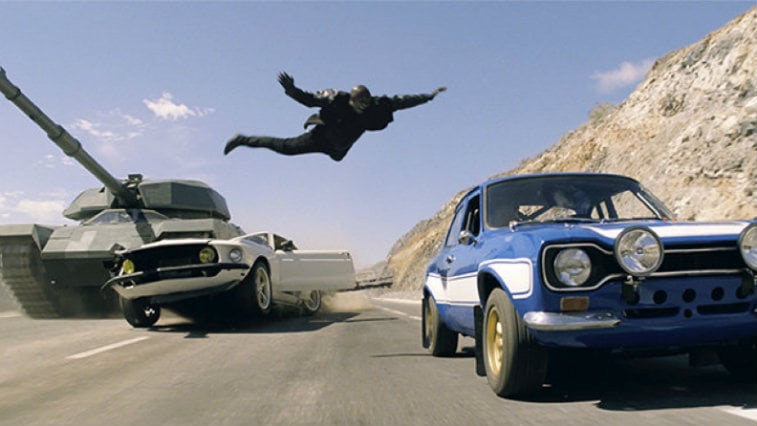 A man leaps from car to car in Fast & Furious 6