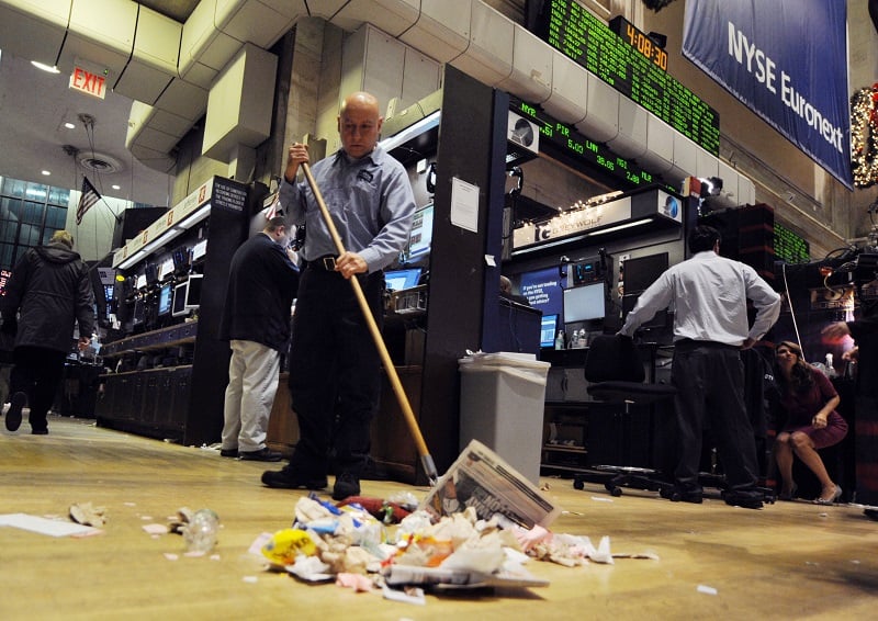 Janitor sweeping | Don Emmert/AFP/Getty Images