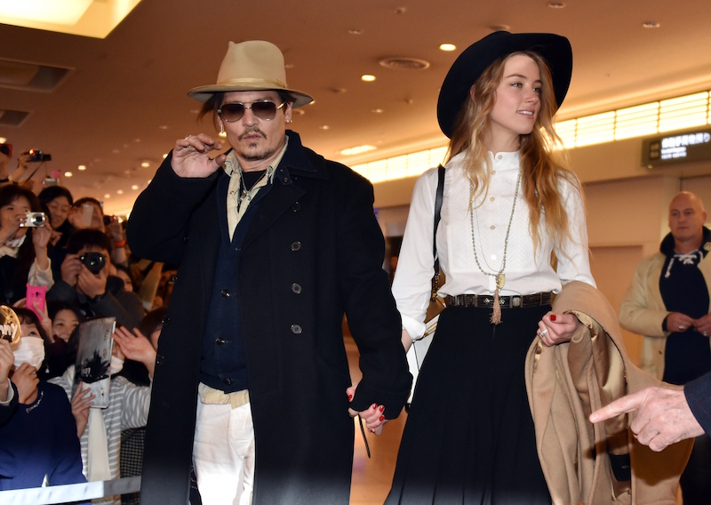 Johnny Depp and ex arrive at an airport