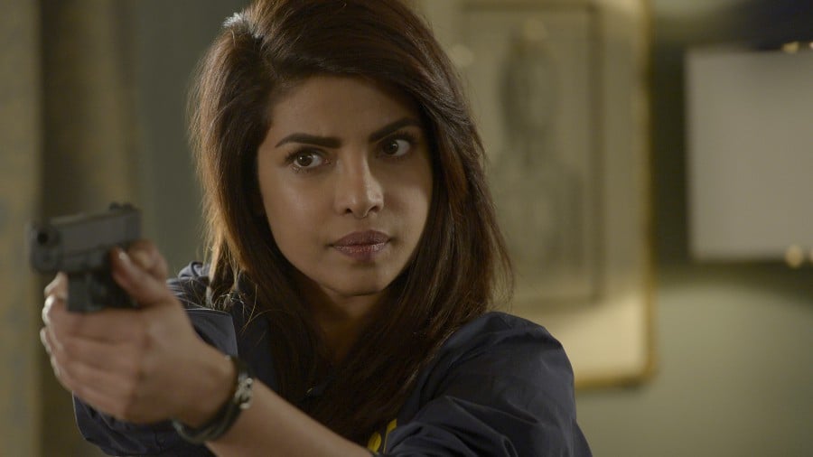 Priyanka Chopra's Alex Parrish holds up a gun in a scene from ABC's Quantico.