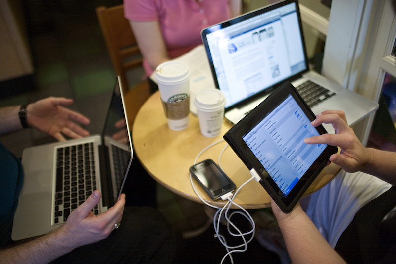 A Starbucks customer uses free Wi-Fi.
