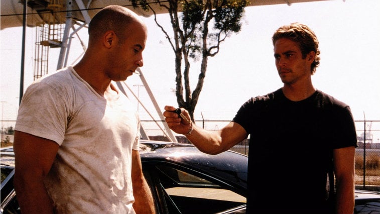 Paul Walker hands keys to Vin Diesel in The Fast and the Furious