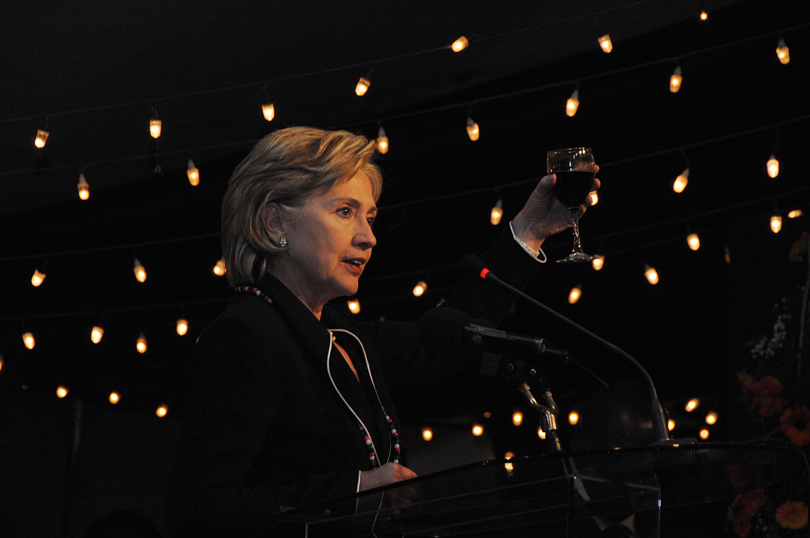 Hillary Clinton with glass of wine