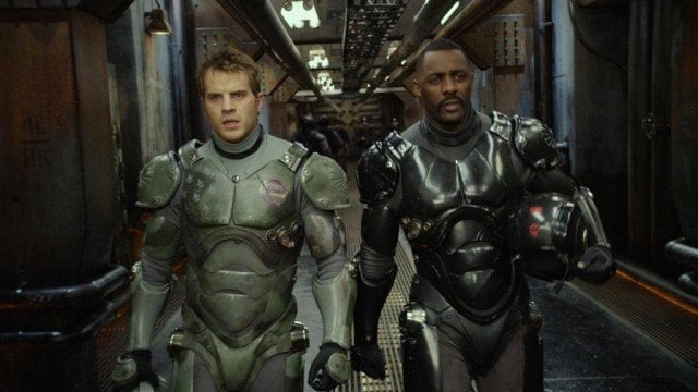Dr. Newton Geiszler (Charlie Day) and Stacker Pentecost (Idris Elba), ready to go to battle in 'Pacific Rim'