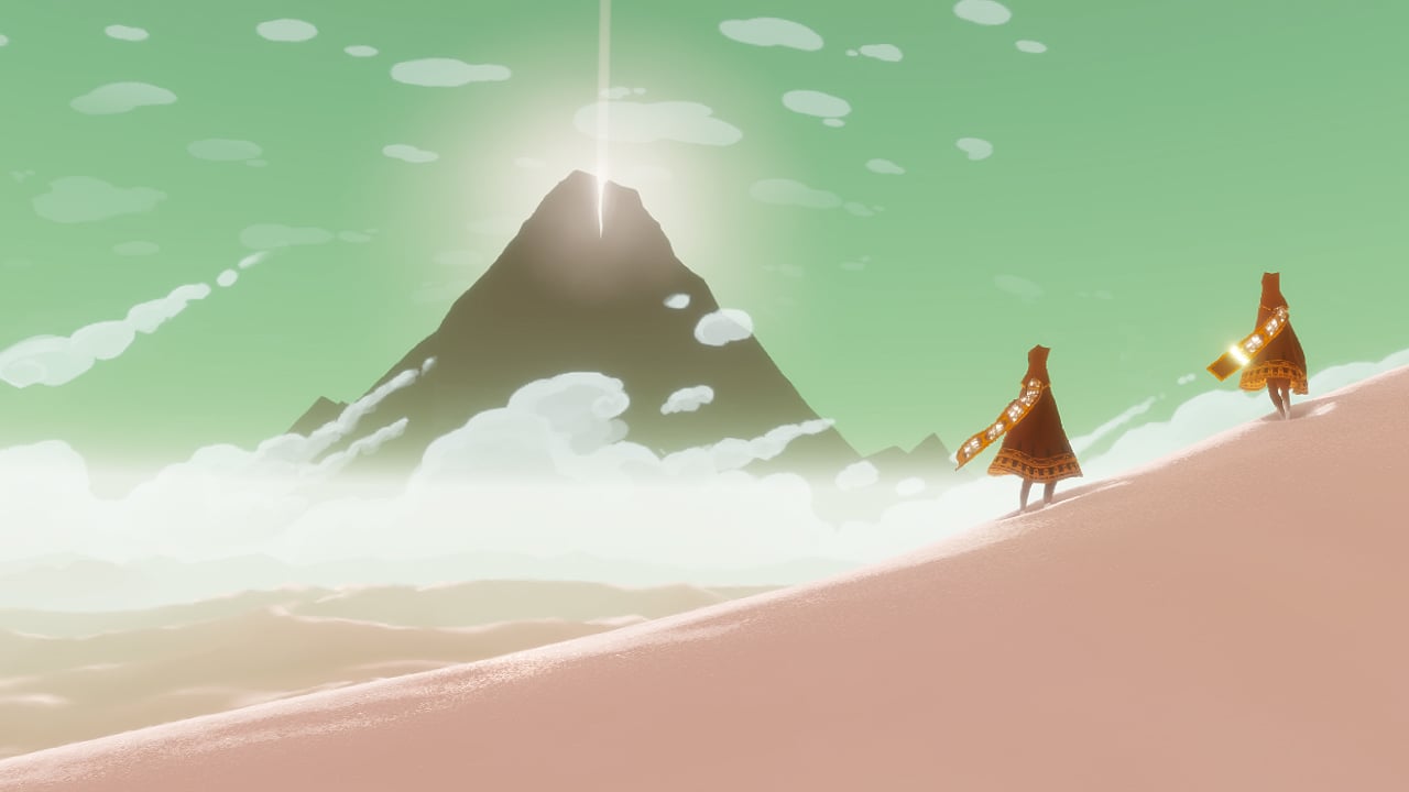 Two cloaked figures walk through a desert toward a mountain.