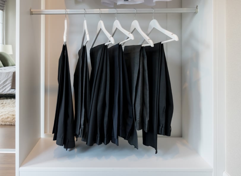 wardrobe with pants on hangers