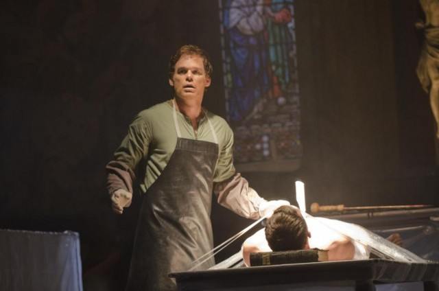 Dexter Morgan (Michael C. Hall) looks shocked as he stands over the bodies of one of his victims in a scene from 'Dexter'