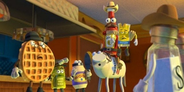 Computer-animated food stand together and look concerned in a scene from 'Sausage Party'