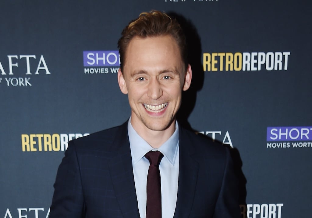 Tom Hiddleston smiles