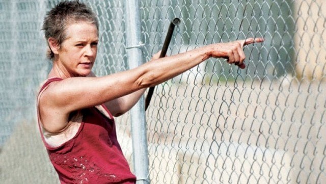 Carol Peletier (Melissa McBride) stands at the prison fences in a scene from 'The Walking Dead'