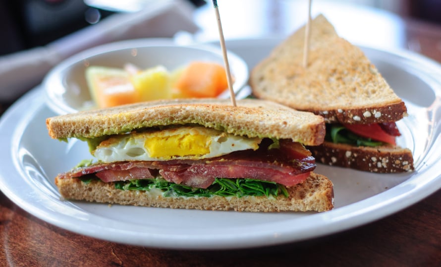 Close up of BLT Sandwich with Eggs