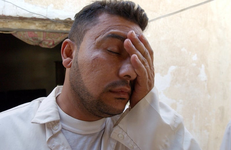 A man wakes up with a hangover
