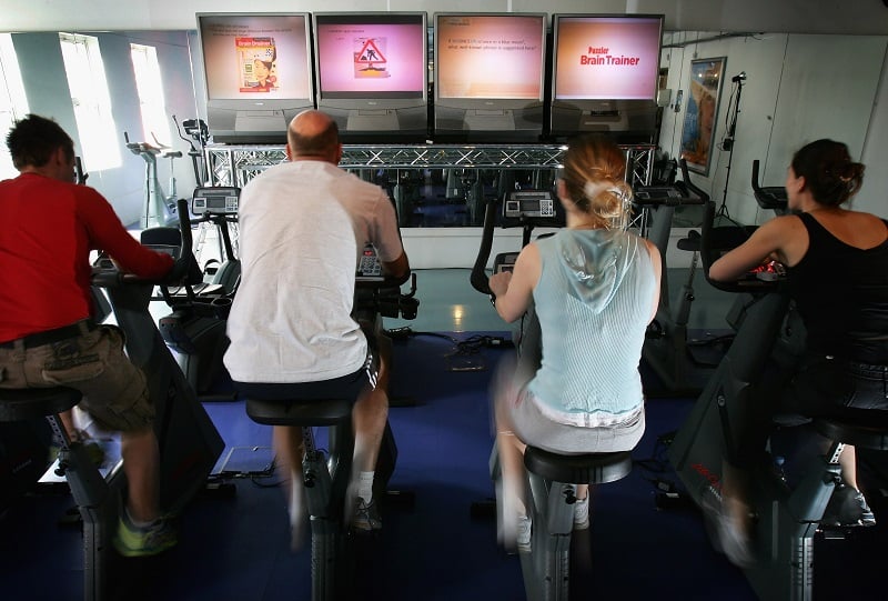 Men and women in their 40s exercising