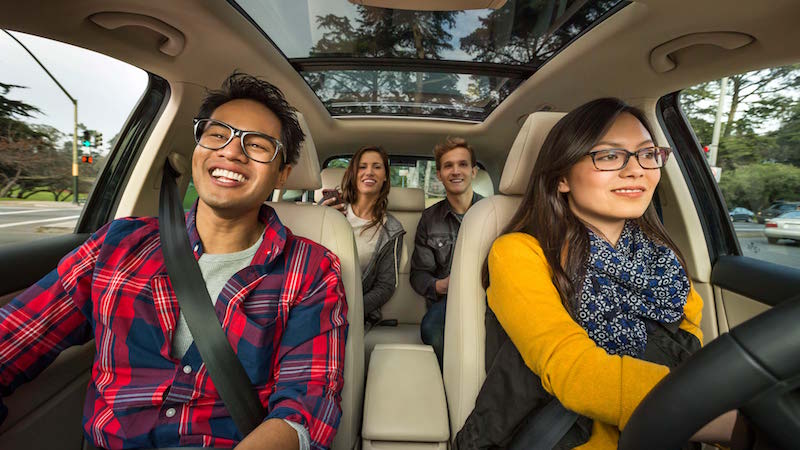 Interior view of a Lyft driver and his passengers