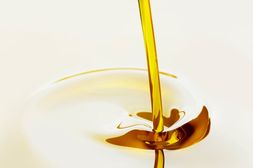 oil pouring on a white background