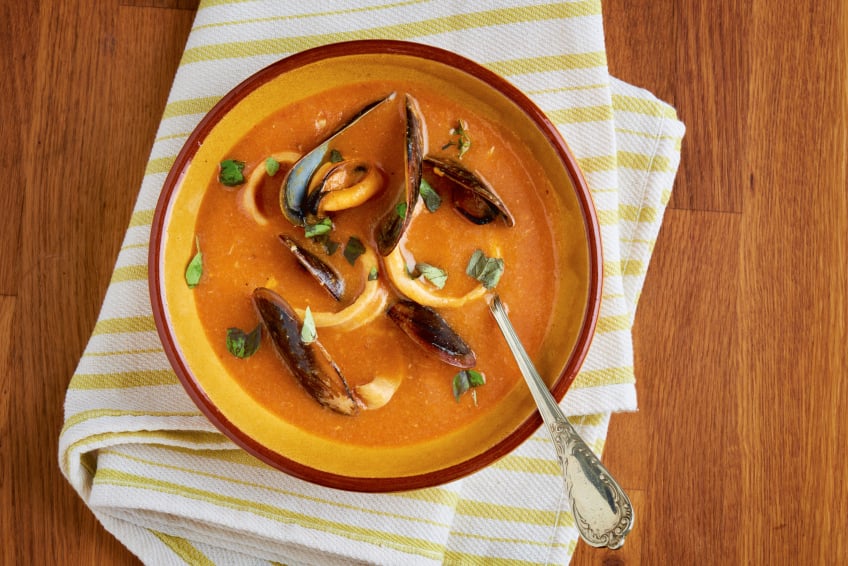 bowl of seafood soup with mussels