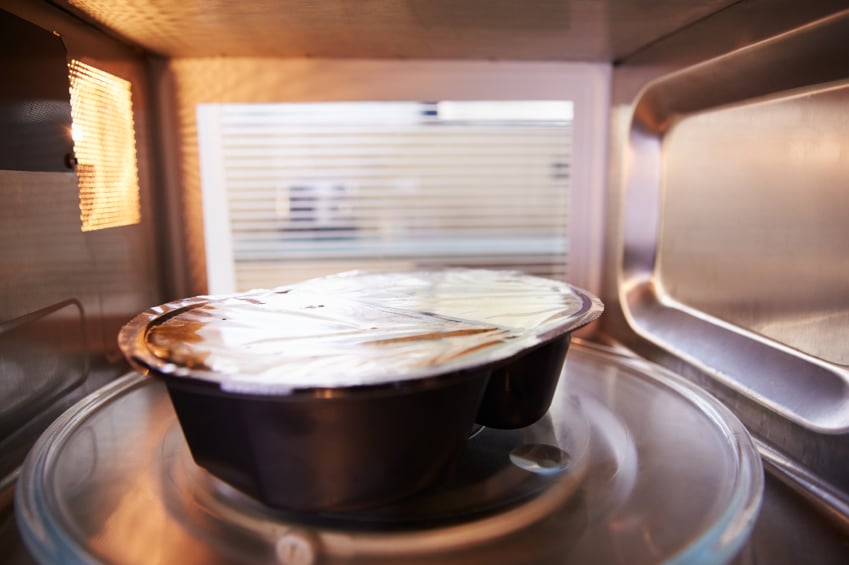 Dinner Cooking Inside Microwave Oven
