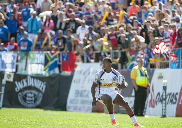 Carlin Isles with the ball during a rugby game against South Africa