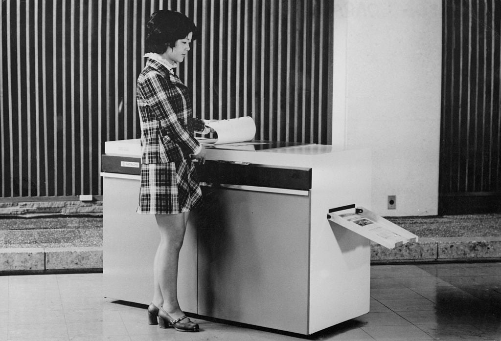 woman using a photocopier