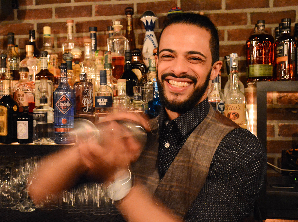 Darnell Holguin shaking a daiquiri