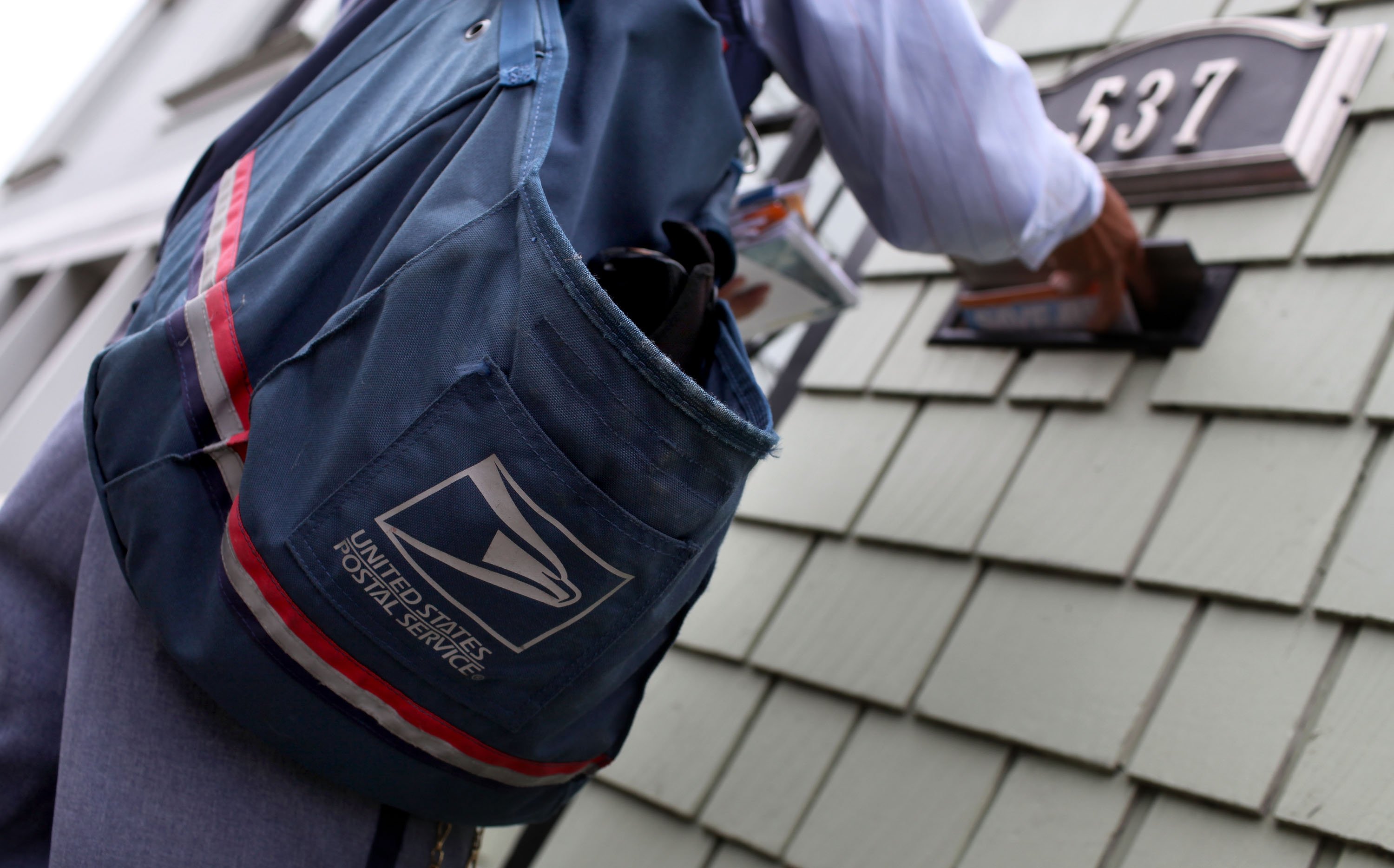 mailman delivering mail
