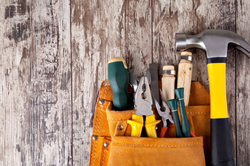 set of tools on a wooden background