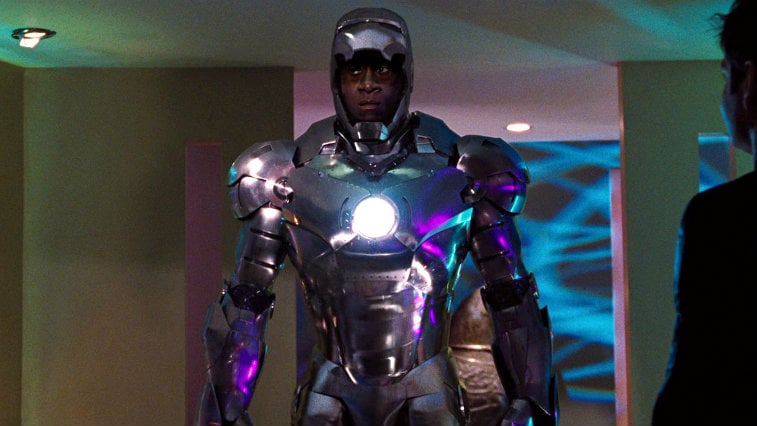 Don Cheadle in a metal suit of armor as War Machine with a fierce expression on his face in Iron Man 2