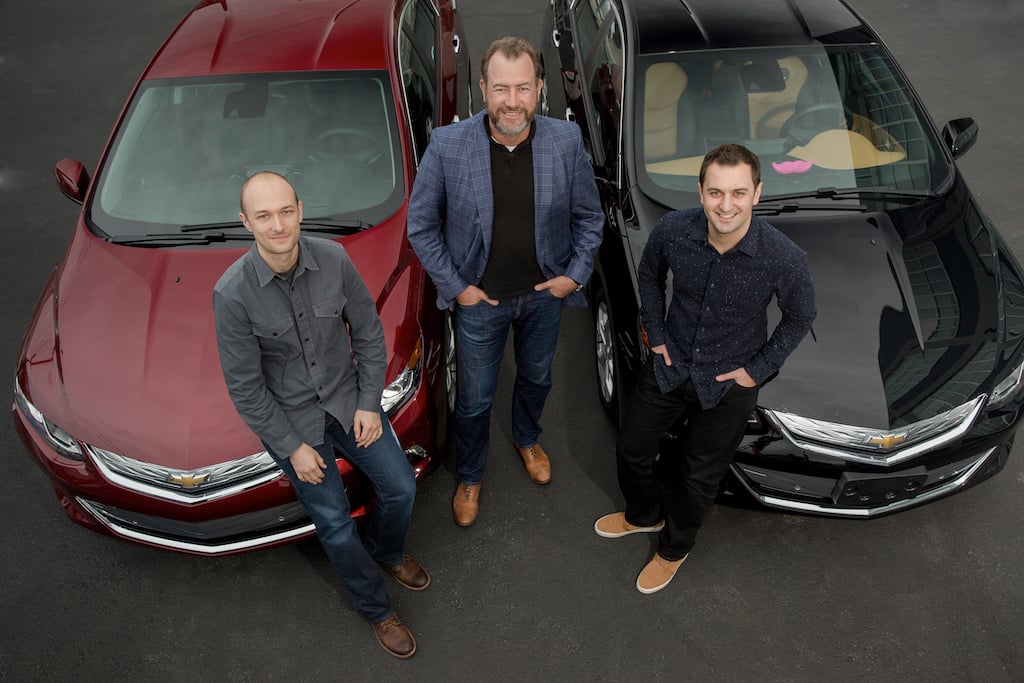 General Motors President Dan Ammann (center) with Lyft Inc. co-founders John Zimmer (right) and Logan Green (left)