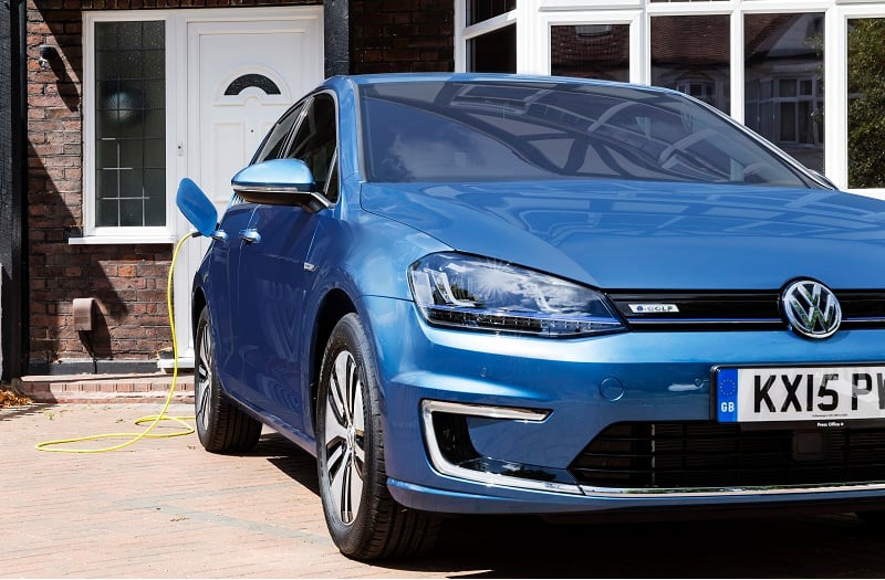 LONDON, UNITED KINGDOM - JULY 21: Go Ultra Low Volkswagen e-Golf on charge on a London driveway on July 21, 2015 in London, England. Ultra-low emission vehicles such as this can cost as little as 2p per mile to run and some electric cars and vans have a range of up to 700 miles.