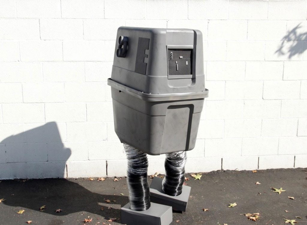 A fan repurposes a garbage can to dress up like a boxy GNK droid from Star Wars