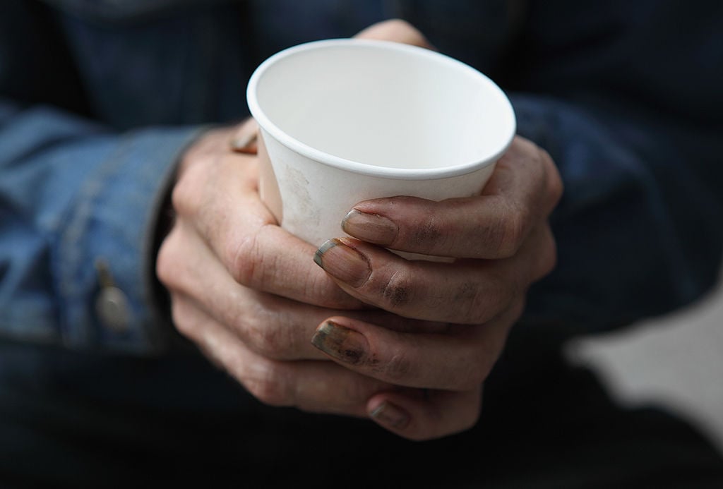 homeless man in poverty panhandling