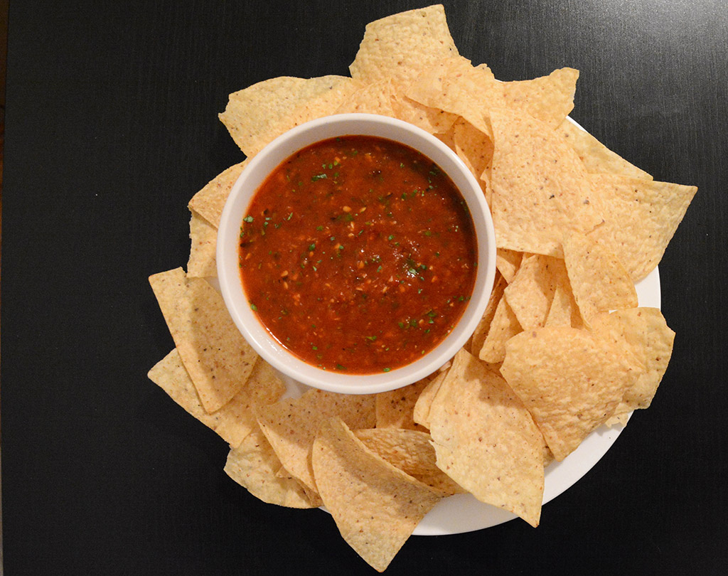 smoky tomato salsa with tortilla chips is a quick appetizer