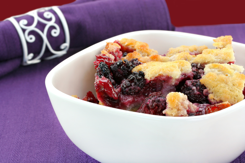 Berry cobbler in a white bowl
