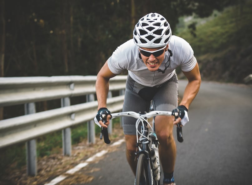cyclist going at maximum effort cyclist going at maximum effort