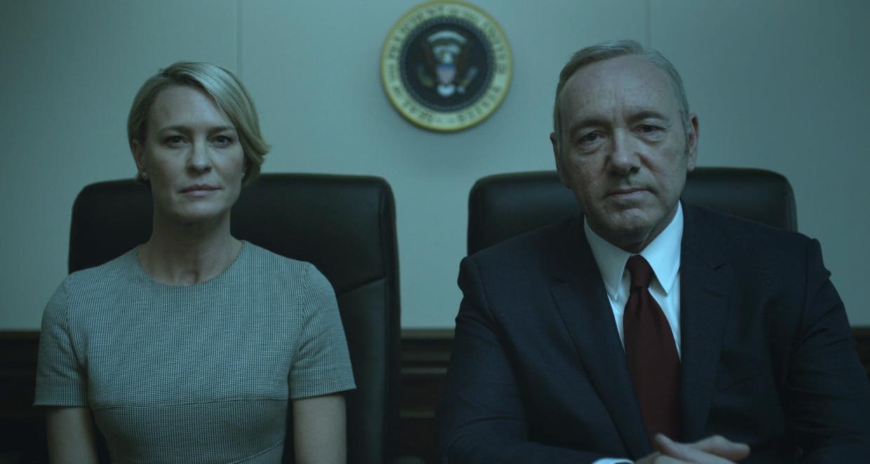 Claire and Frank sit next to each other in House of Cards