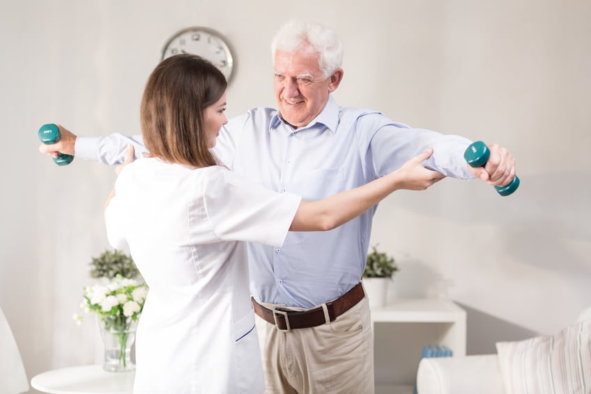 Nurse helping elderly patient