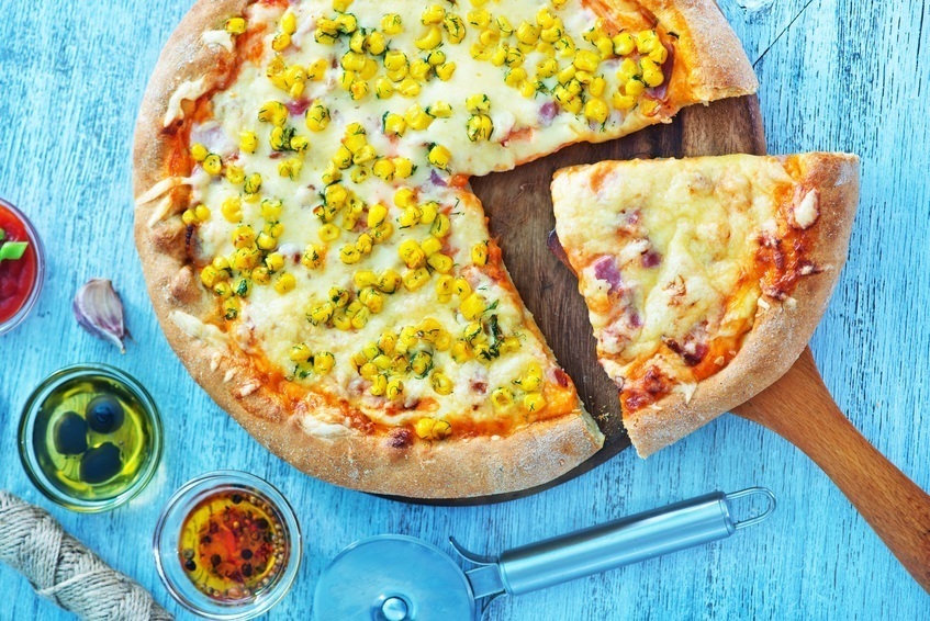 fresh pizza on a blue background