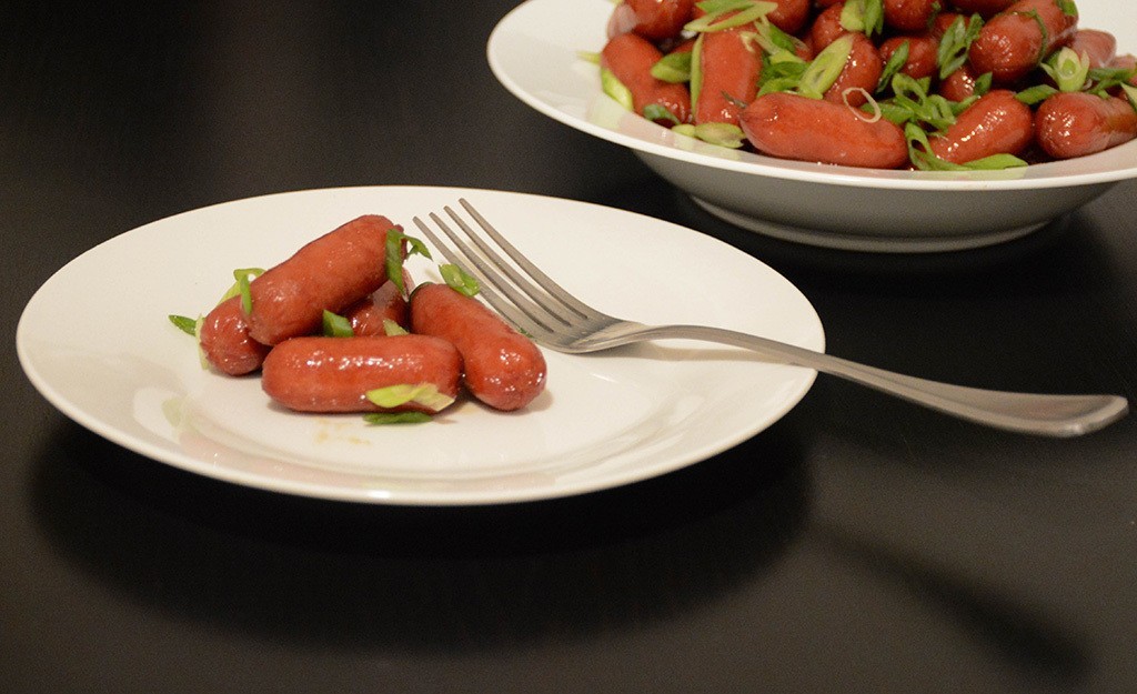 individual helping of maple-bourbon cocktail franks