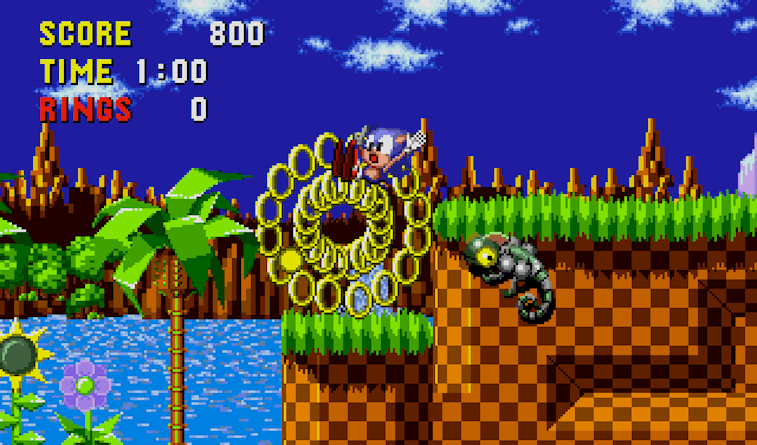 Sonic getting hit and losing his rings.