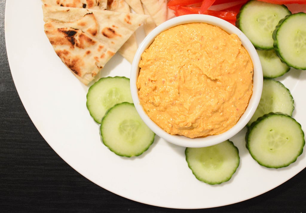 overhead close-up of spicy feta dip with cucumbers