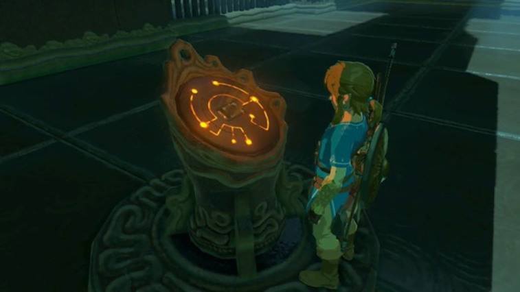 Link looks at a glowing stone in the new Zelda game.