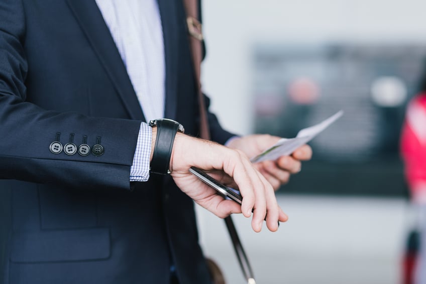 man checking time on his watch