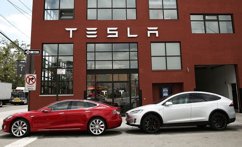 NEW YORK, NY - JULY 05: Tesla vehicles sit parked outside of a new Tesla showroom and service center in Red Hook, Brooklyn on July 5, 2016 in New York City.