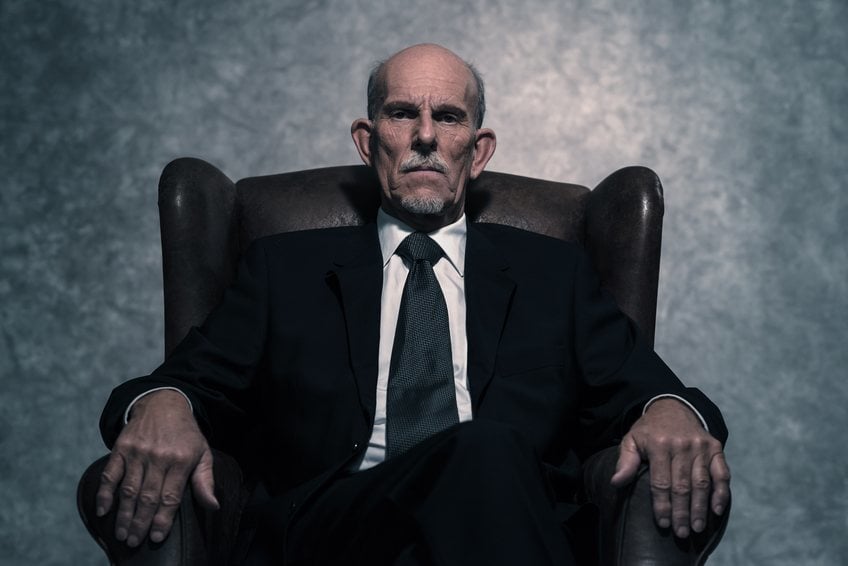 senior businessman sitting on a chair